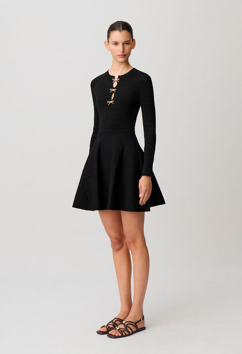 Short knitted dress with knots