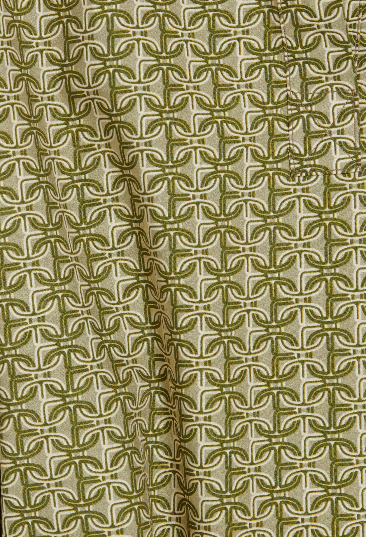 Short green monogram dress