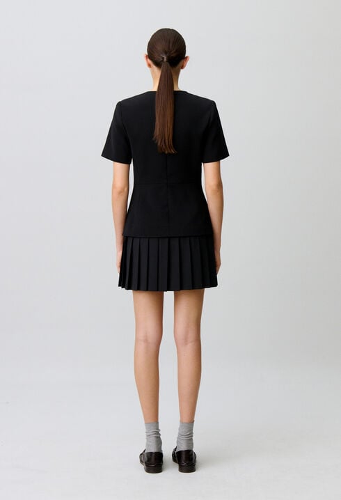 Short pleated peplum dress